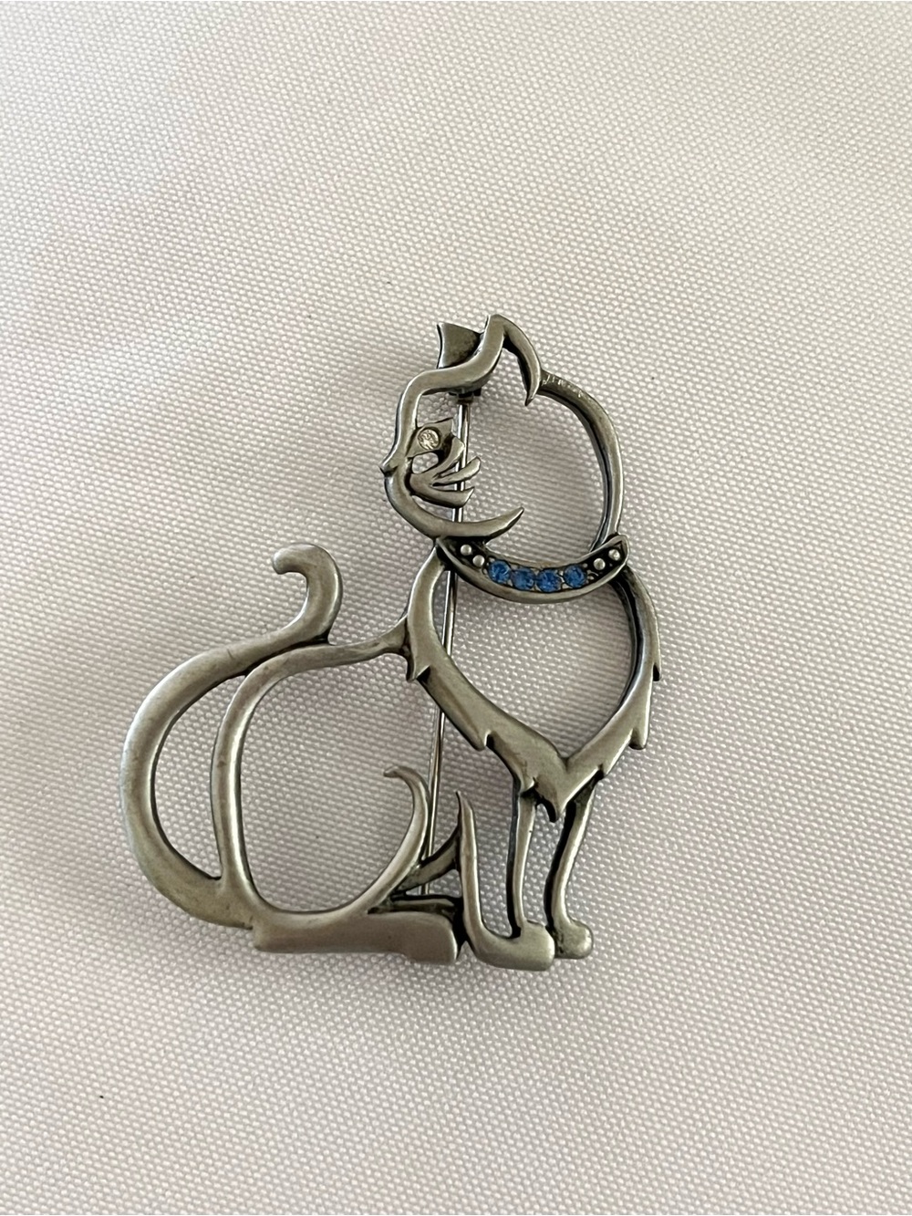 Vintage Jonette Brooch Featuring An Open Silhouette Seated Cat